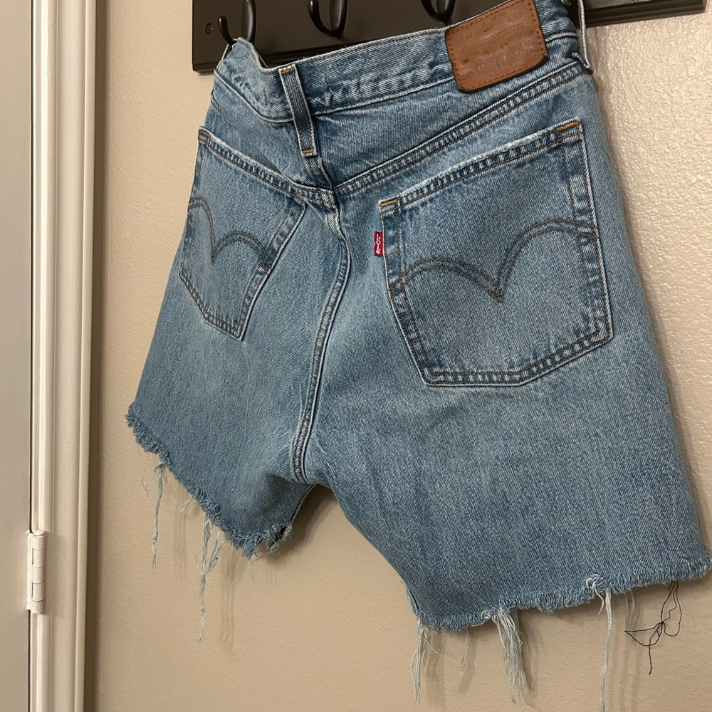 Levi's Blue Denim Jeans with Frayed Hem